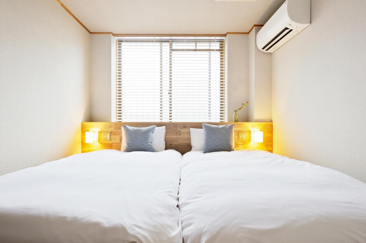 Nid Osaka Kurosaki Apartment Bagian luar foto
