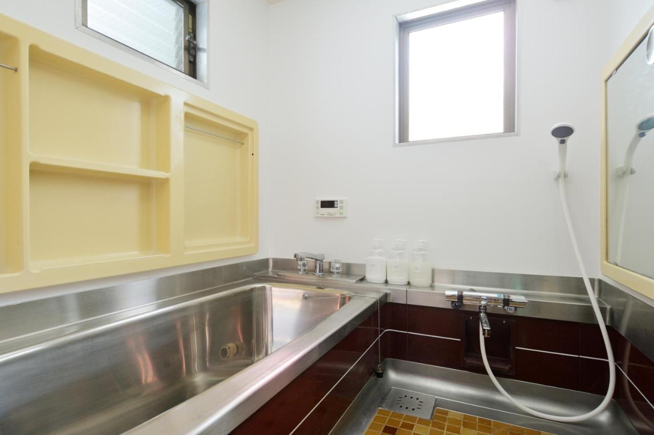 Nid Osaka Kurosaki Apartment Bagian luar foto