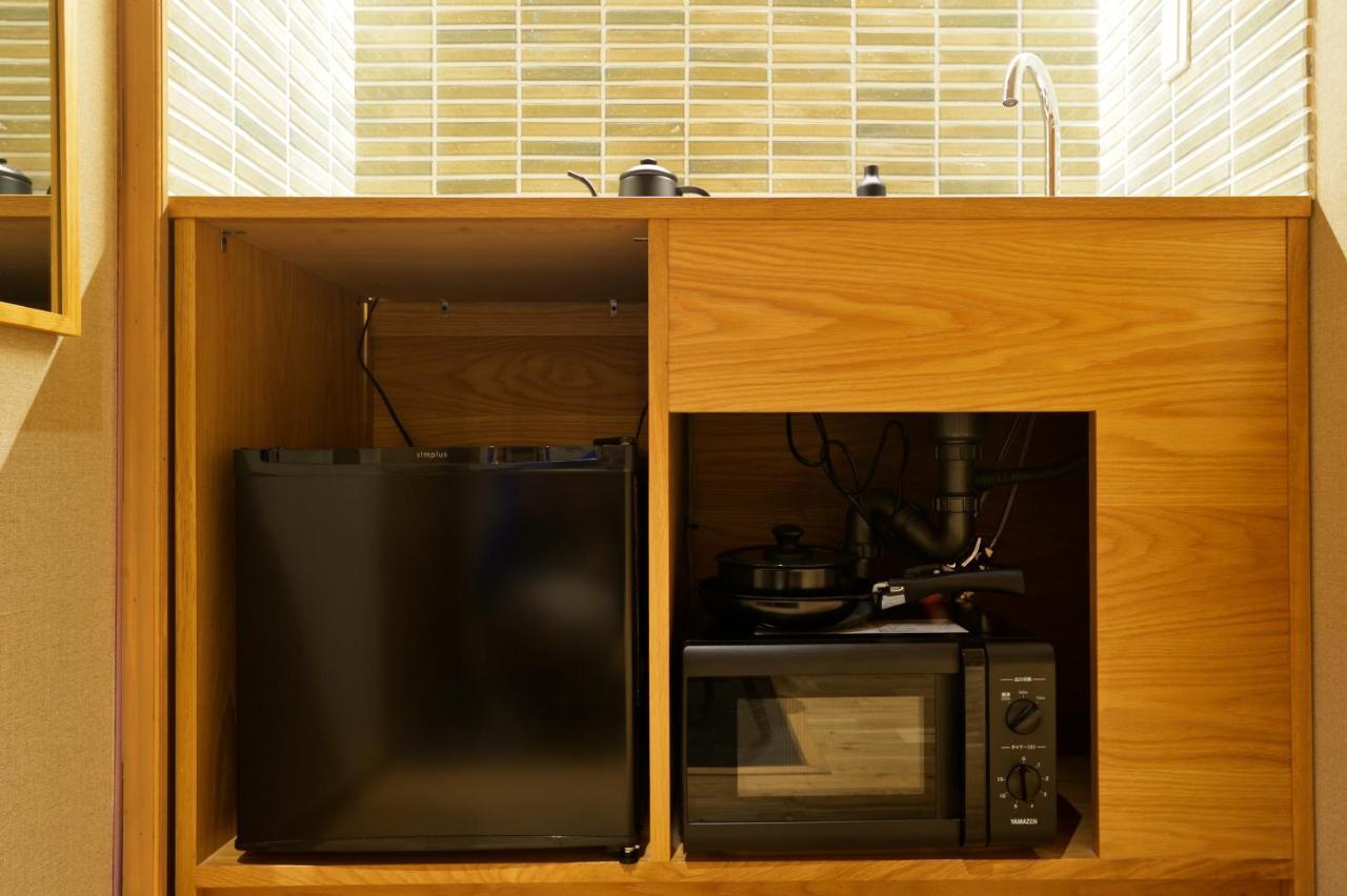 Nid Osaka Kurosaki Apartment Bagian luar foto