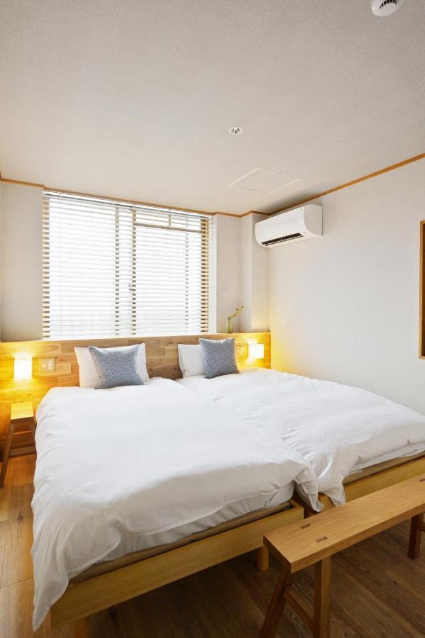 Nid Osaka Kurosaki Apartment Bagian luar foto